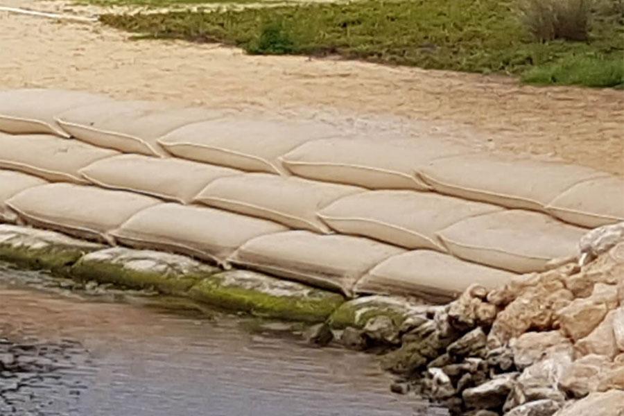 New Software for Erosion Protection with Geotextile Sand Containers Secutex® Soft Rock