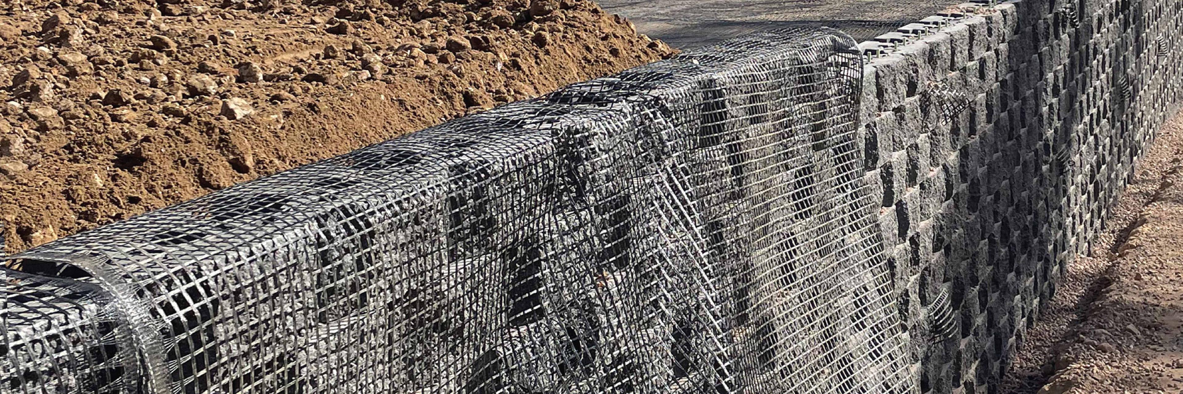 Turning Site Soil into Structural Strength: ACEGrid® Reinforced Block Wall Construction