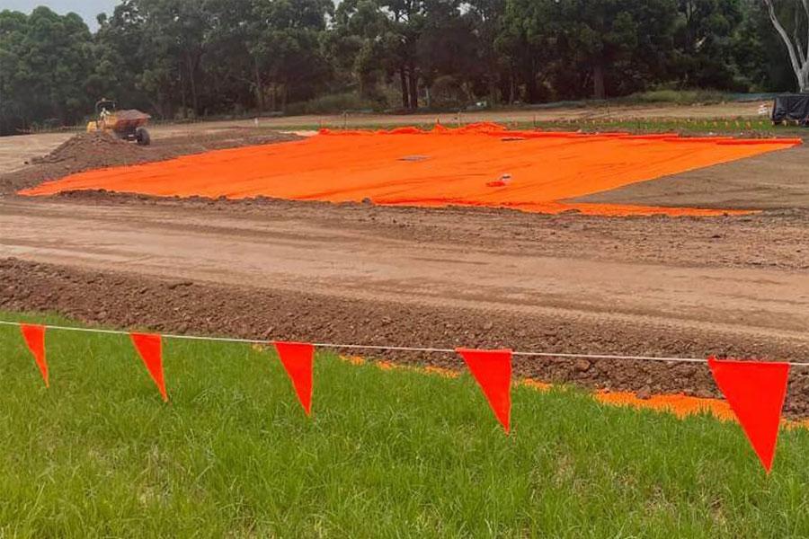 Safeguarding St Patrick's College Sports Field Construction with ProFab® Hi-Vis Marker Layer